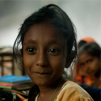 Asha, a student from class 1, at Amader Pathshala.