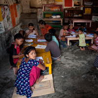 Students from another NGO school at Mirpur must share one room for five classes.